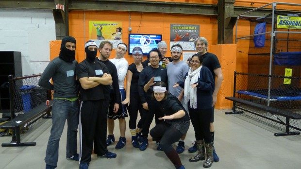 Dimagi team posing in headbands after a dodgeball tournament at the 2012 all-hands meeting