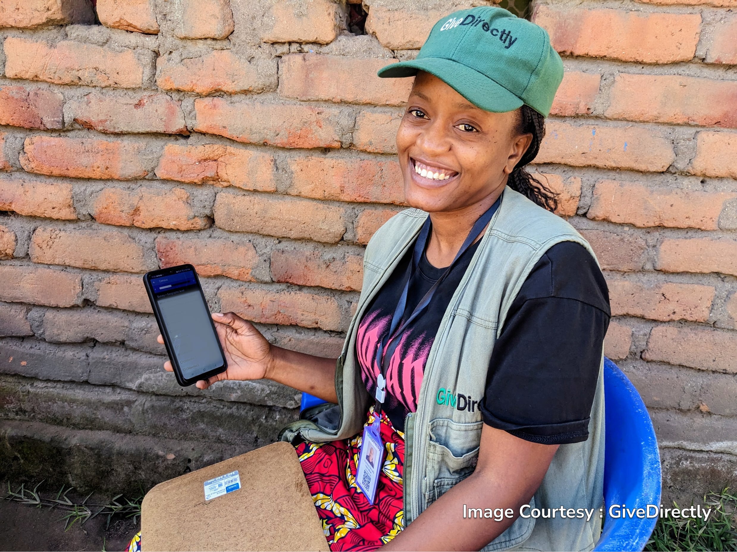 Frontline worker collecting data with CommCare mobile app as a scalable survey tool alternative